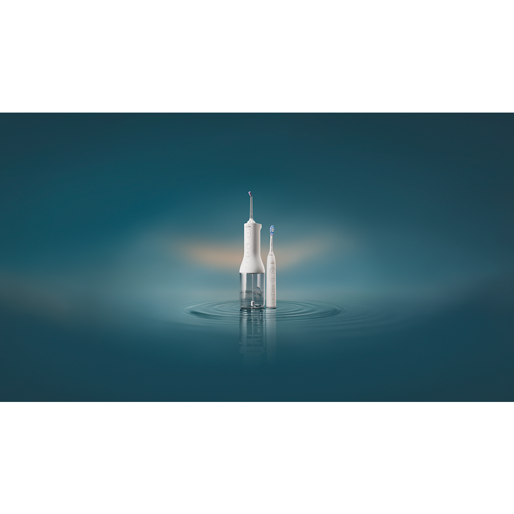 Philips Sonicare Cordless Power Flosser 3000 + četkica za zube Sonicare serije 7100 HX3887/41